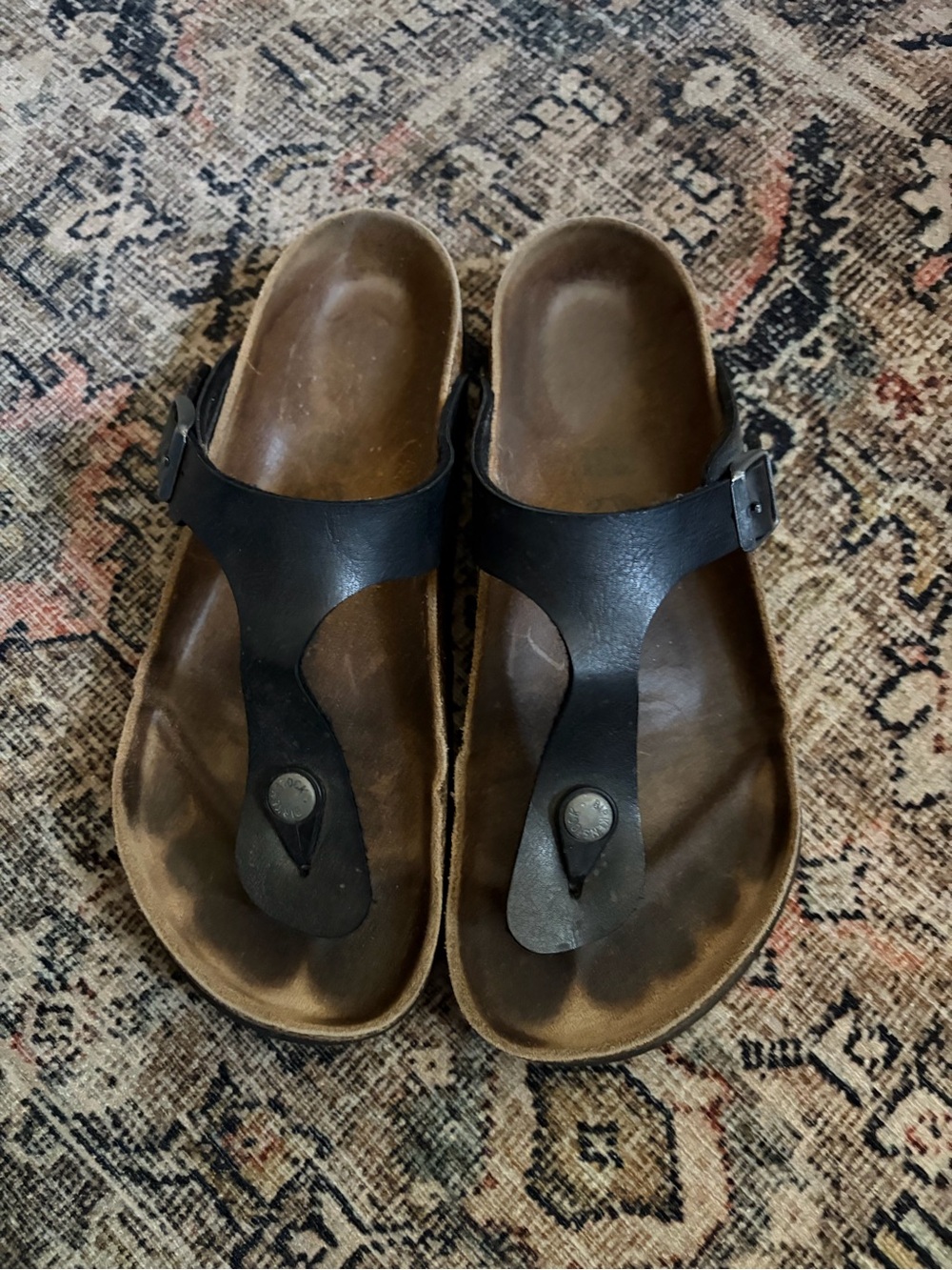 Well worn Birkenstock Black Leather Thong Sandals